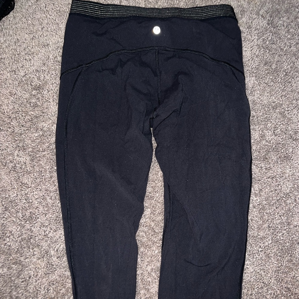 Black with gold accent Lululemon leggings